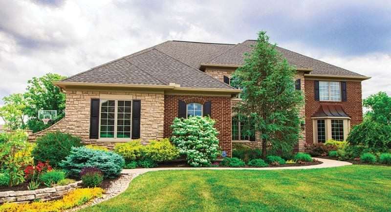multi story house with new roof