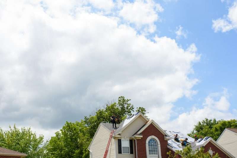 Roofers at work