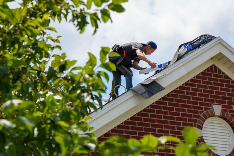 Roofers at work