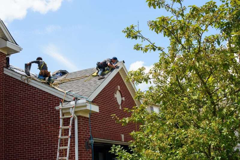 Roofers at work