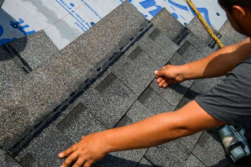 Roofers at work