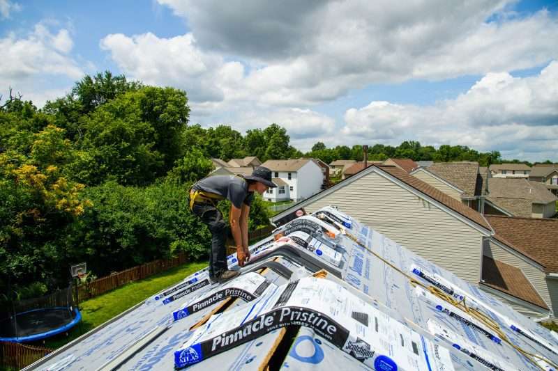 Roofers at work