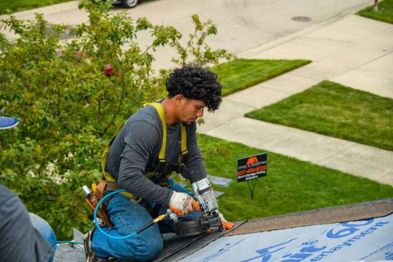Roofers at work