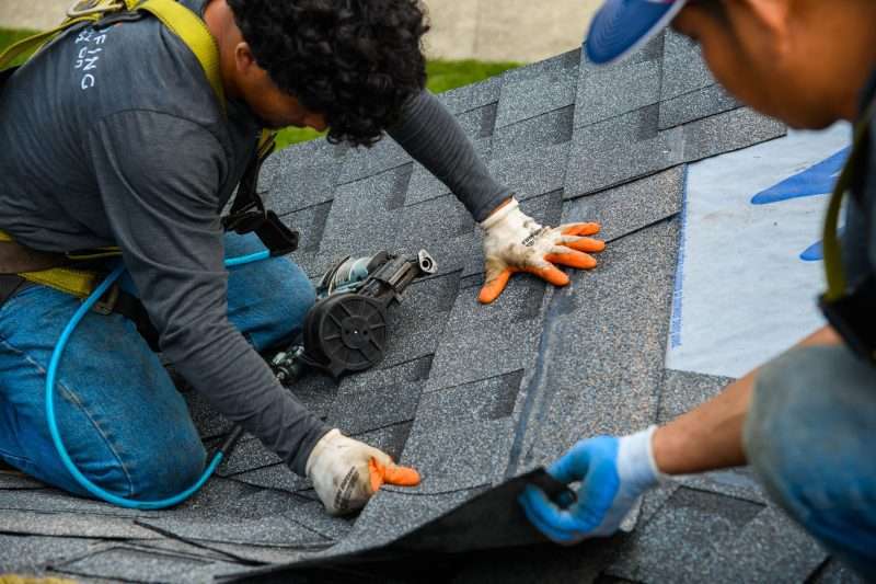 Roofers at work