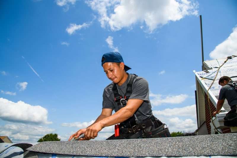 Roofers at work